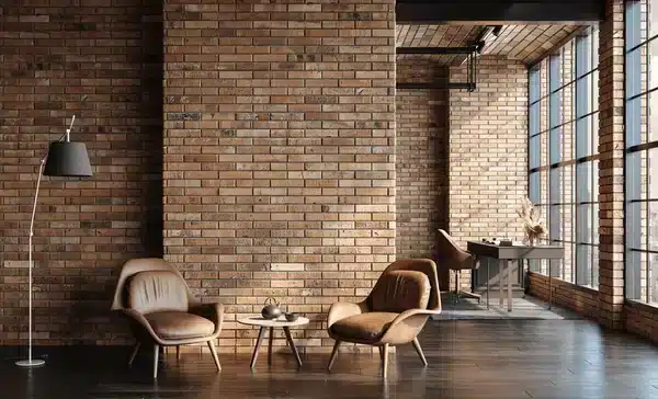 brick design walls and chairs along with floor lamp