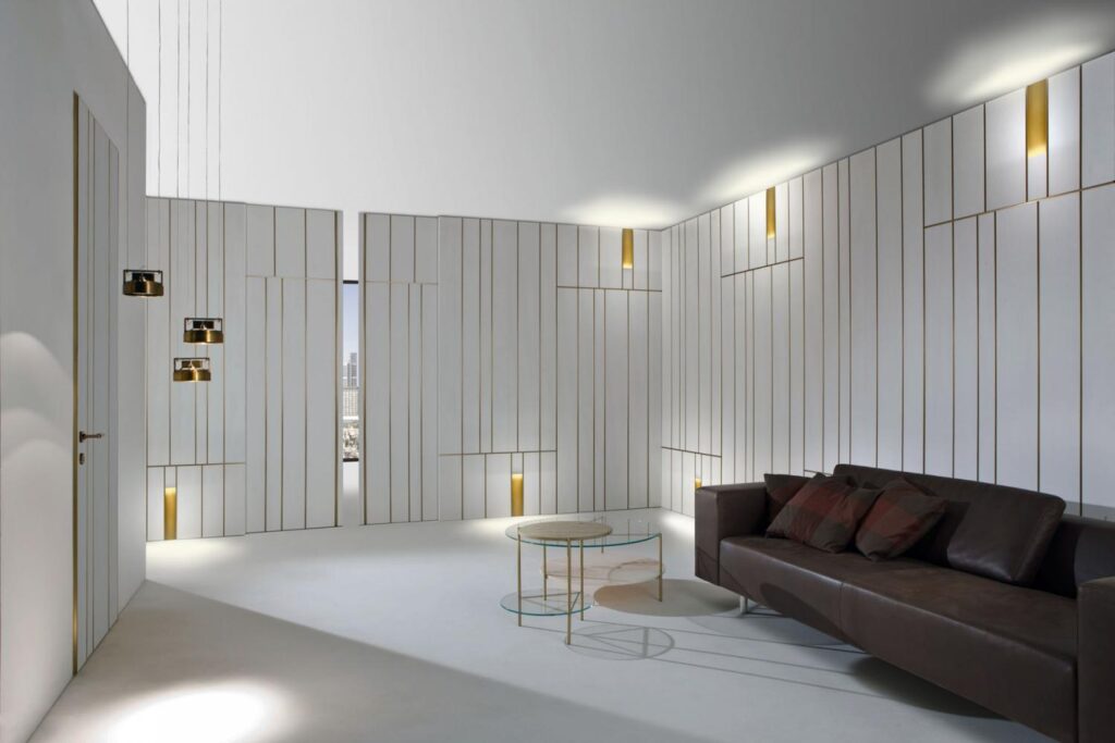 line panelling in office along with the sofa set and tables with minimal lightening