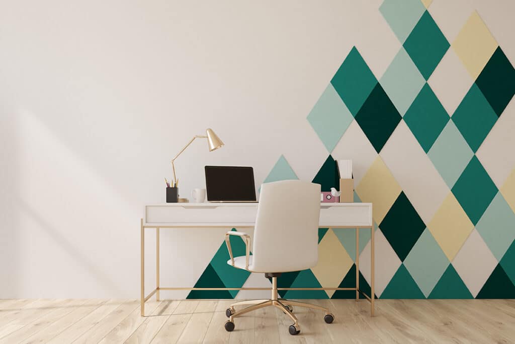 office setting with the geomatrical pattern on walls along with table chair and other essentials