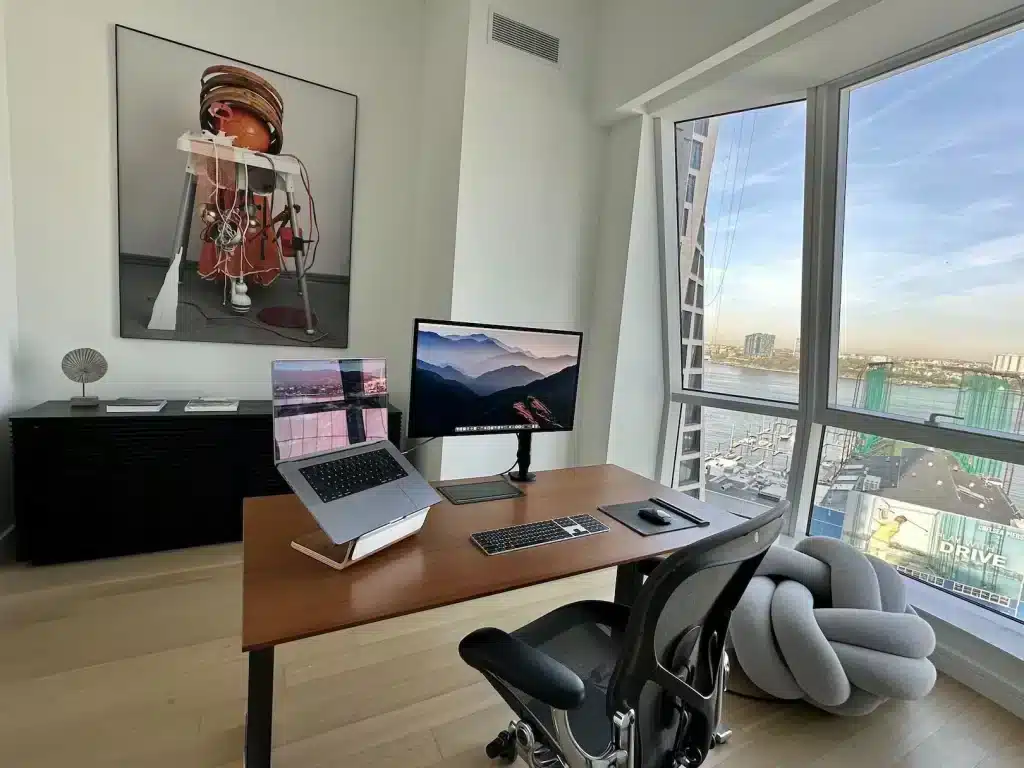 office with light color walls systems on table a chair and other furniture in the office room