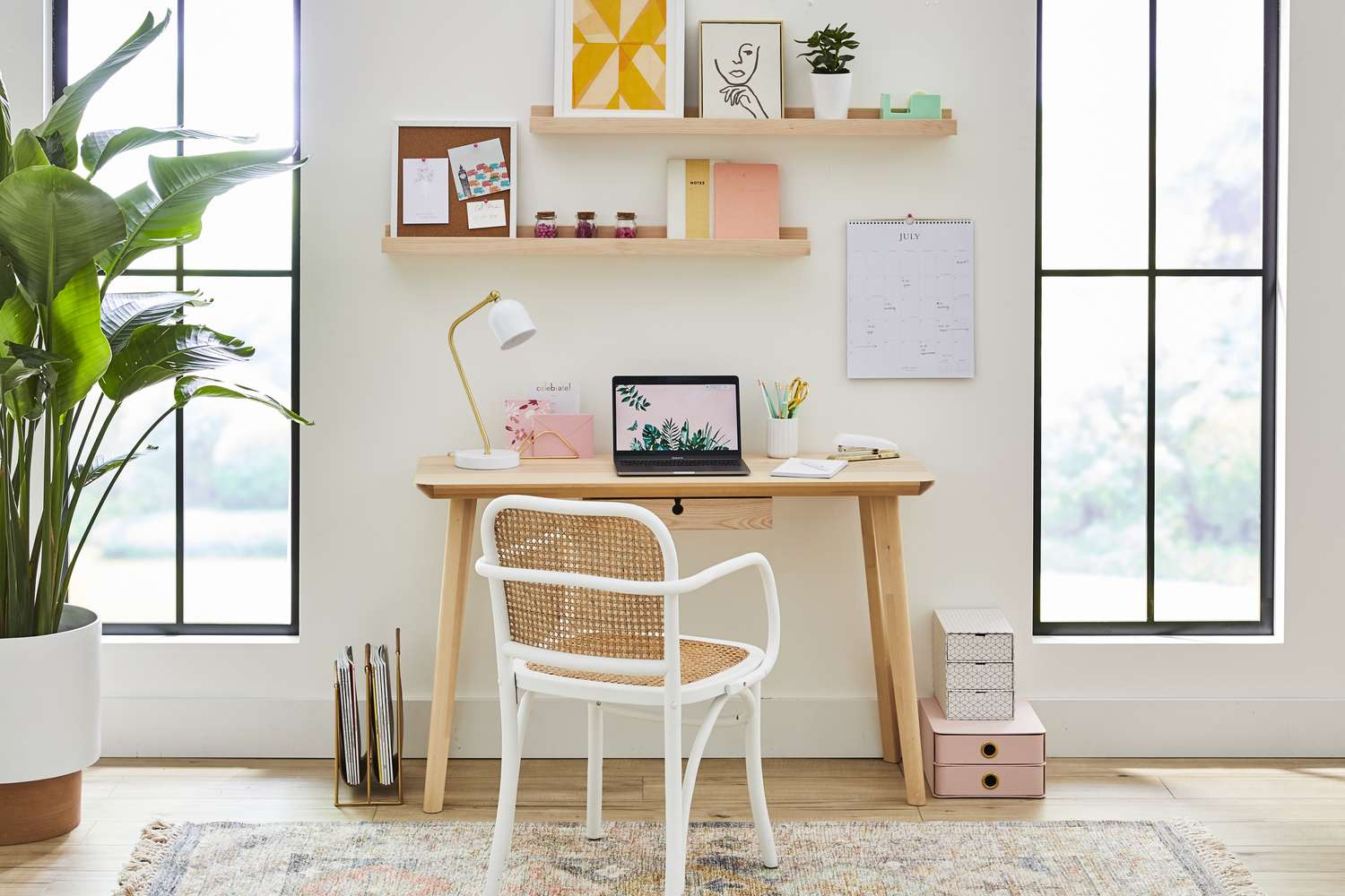 eye catching art wokr on floating shelves a wokring chair a desk a plant and a rug