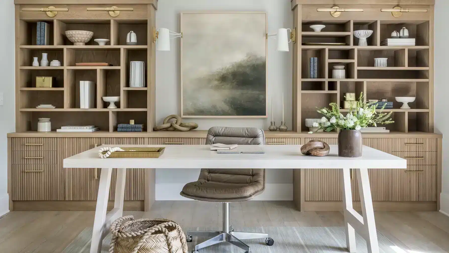 storage shelves in a home office working desk and a chair plant pot placed on the table