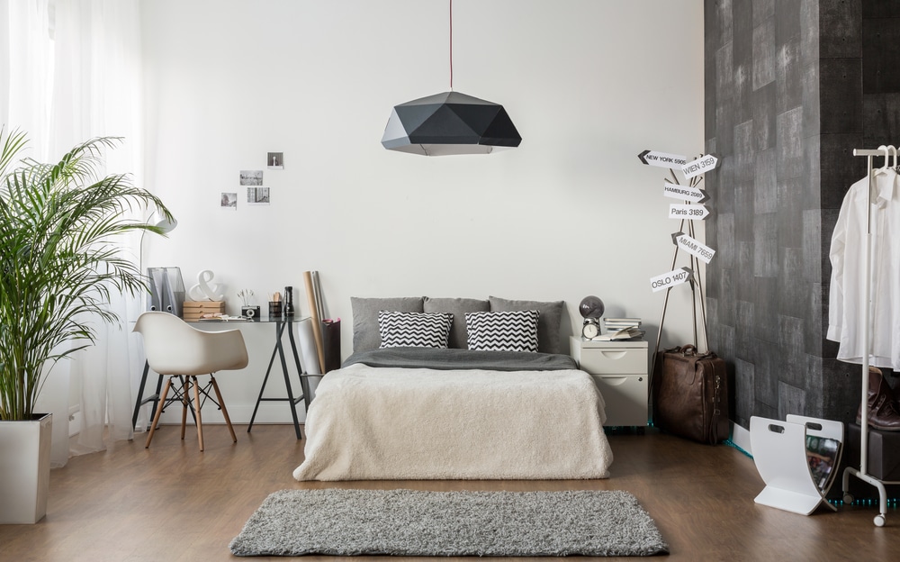 Interior Of White And Gray Cozy Bedroom