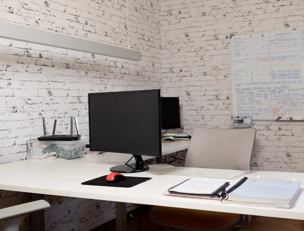 Office With Rustic Decor And Exposed Bricks 