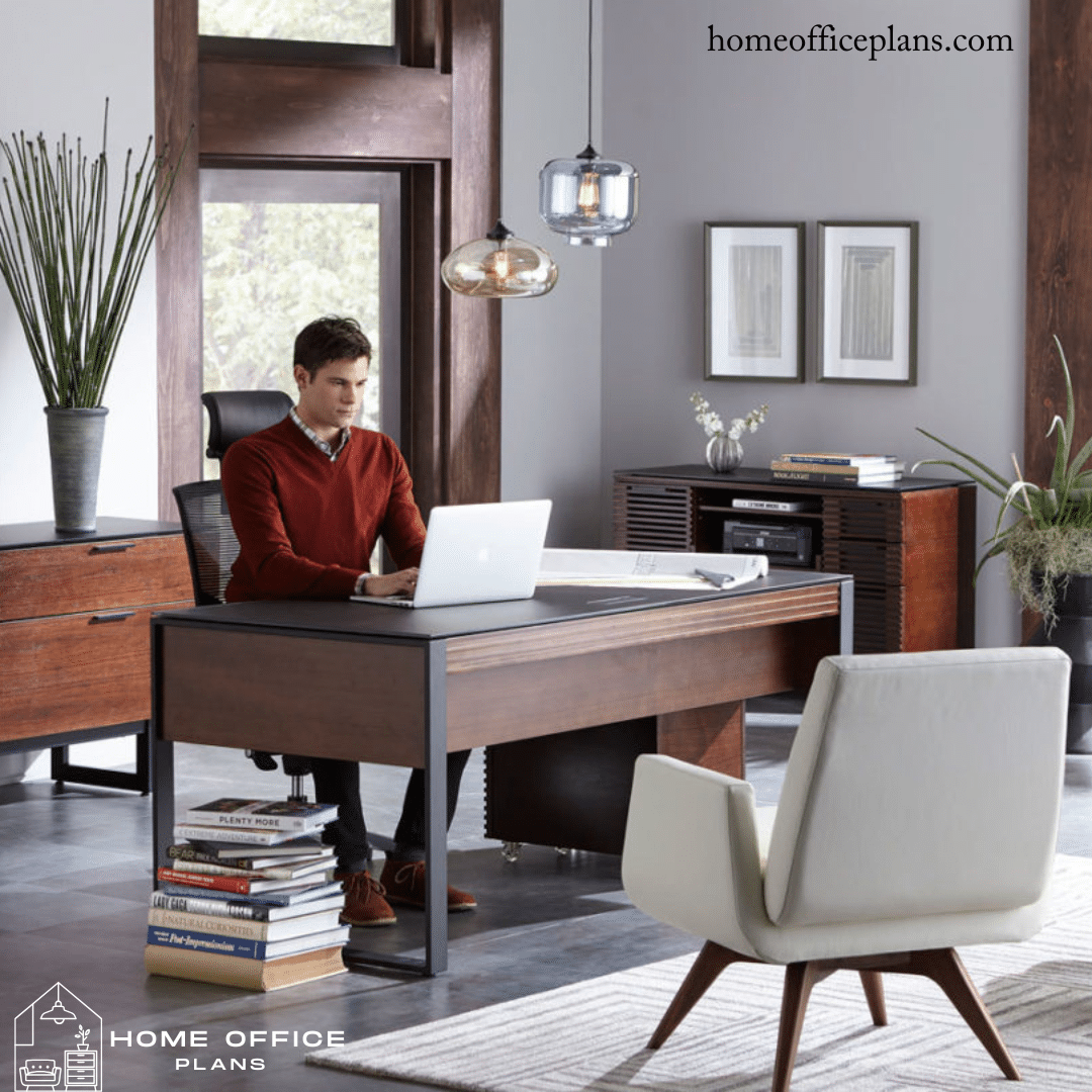 a person working in the office sitting on the chair